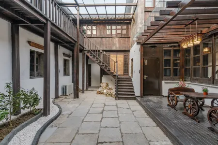 Suzhou Liuze Homestay Отели рядом с достопримечательностью «Wansheng Rice Merchants»