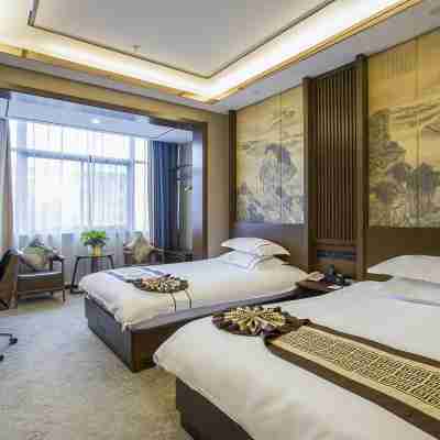 Wanqing Zhenyuan Hotel Rooms