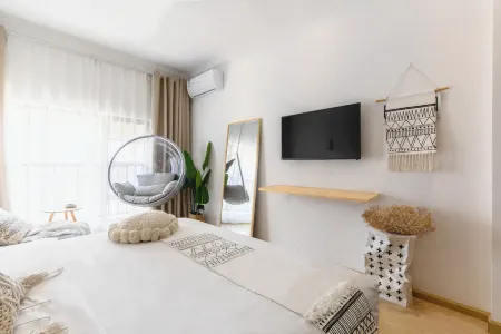 Vi Home Hotel Отели рядом с достопримечательностью «Kunming University of Technology Chenggong Campus College of Mechanical and Electrical Engineering»