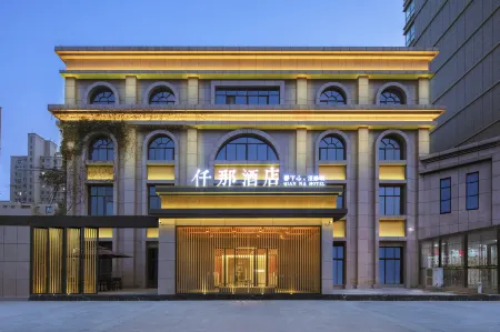 QIANNA HOTEL (Xinxiang Hualan Avenue Pangdonglai Shopping Plaza) Отели в г. Синьсян