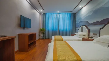 Shangpin Business Hotel Отели рядом с достопримечательностью «Taiji Wuse Valley»