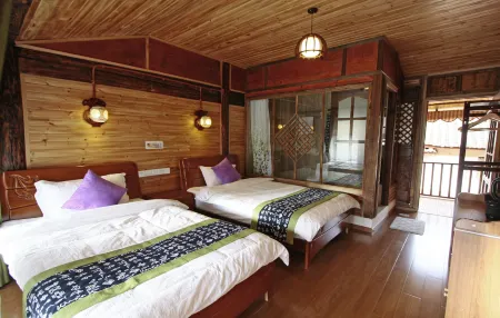 Tianjingsha Inn Отели в г. Цзянчуань