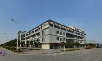 Green Alliance Hotel (Xuzhou Sanhuan North Road Haodejia Material Market) - Housity