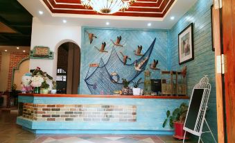 Luoping Huaying Image Theme Inn