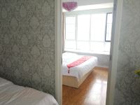 青岛自由空间度假公寓 - 温馨家庭套房