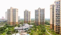 Manli Holiday Apartment Hotel dekat Mission Hills Huayi Brothers Feng Xiaogang Movie Town