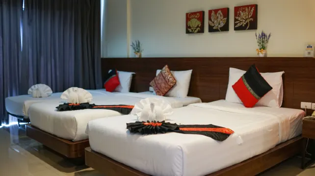 ห้องพักสำหรับสามท่านพร้อมระเบียง