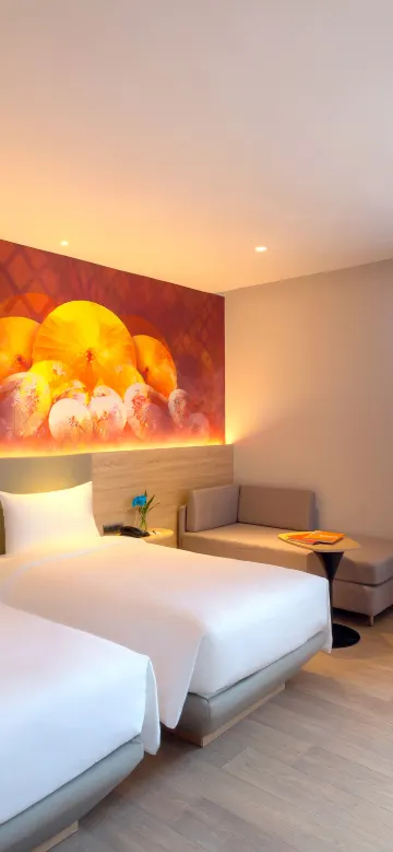 ห้องสุพีเรียร์พร้อมเตียงเดี่ยว 2 เตียงและโซฟา