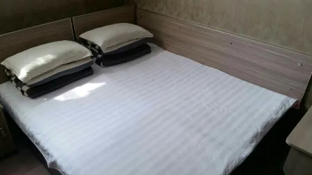 Bayan Xingyuan Hotel Отели рядом с достопримечательностью «Fucaimen»