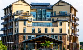 Mulan Caoyuan Holiday Hotel - Housity