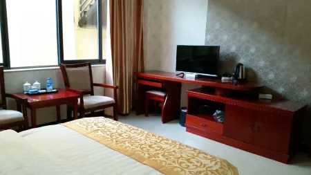 Shuangjiang Xinxin Hotel Отели рядом с достопримечательностью «White Elephant Temple»