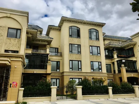 Qidong Four Clover Hotel Отели рядом с достопримечательностью «Yuantuojiao Scenic Resort»