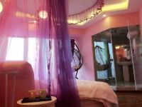 绵阳小时代主题公寓 - 浪漫满粉紫致情侣圆床房
