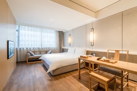 The Hidden House Hotel(Chengdu DuFu Thatched Cottage Southwest University of Finance) Отели рядом с достопримечательностью «Chengdu Wuhou Jinhuaqiao Residential District Jinfeng Community Cultural Center»