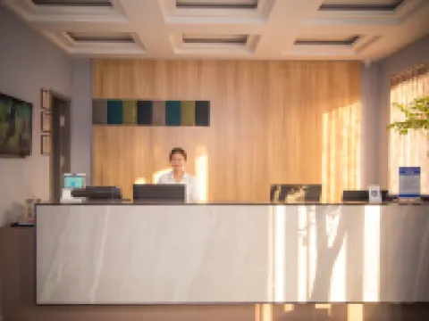 Home Inn Yubai Yun Hotel (Pingdu Xiamen Road Olympic Sports Center) Hoteles en Pingdu