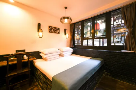 Elsewhere hotel（Inn West gate） Отели рядом с достопримечательностью «Ming and Qing Dynasty Ancient Street»