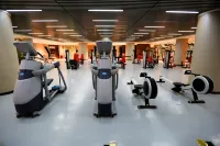 Universal Hotel Urumqi - salle de sport