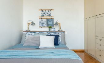 Skyline View Biancamano 1 Bdr with Balcony by Rentopolis