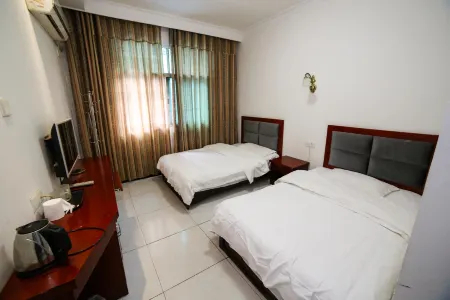 Fuyuan Hotel (Yueyang Dongfang Road Shop) Отели рядом с достопримечательностью «Zhang Guying Village»