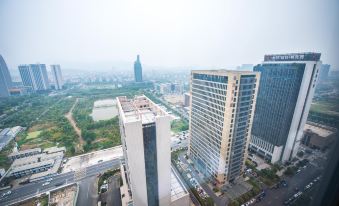 Weifeng GC Hotel (Zhuji Xiongfeng Yongli Commercial Plaza)