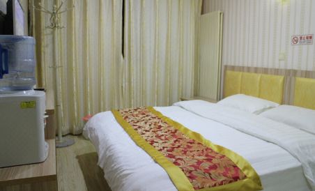Huixin Business Hotel - Housity
