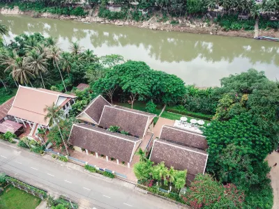 The Apsara Rive Droite Hotel in zona Tempio della Città d'oro (Wat Xieng Thong)