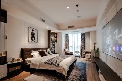 Chaoqu Designer Boutique Apartment(Guangzhou Panyu Wanda South Village Wanbo Metro Station) Hotels near Jisheng Weibang International Home Furnishings Exposition & Exhibition Center