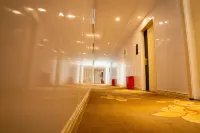 Xinyang Xingang Business Hotel - 2 Yıldız