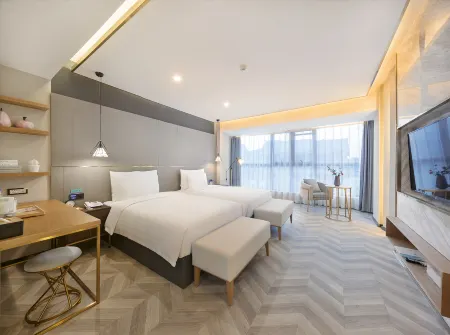 Moshe Banmu Huatian Hotel Отели рядом с достопримечательностью «Kaifeng Gulou Plaza»