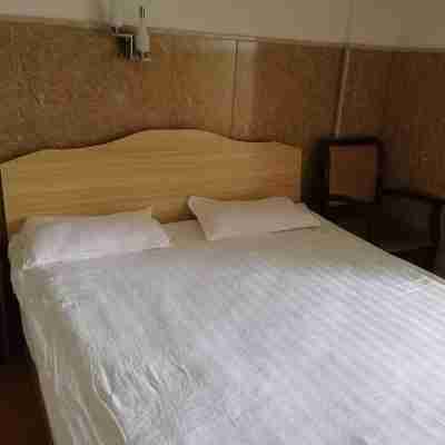 Nanfeng Saiyu Business Hotel Rooms