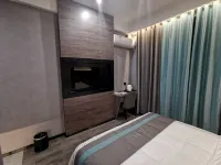 QiYuejingpinjiudian - ที่มีที่จอดรถ