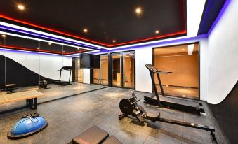 The home features a spacious gym and a versatile indoor-outdoor living area at Atour Hotel