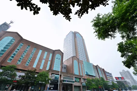 Excemon Peace Hotel Отели рядом с достопримечательностью «Anhui Institute of Business Administration»