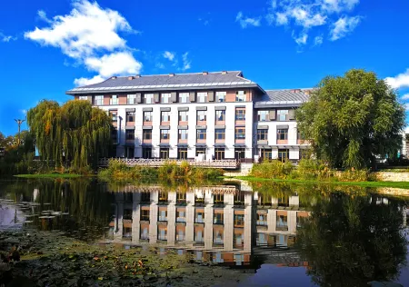 Xin Yue Wan Hotel Отели в г. Цюйфу