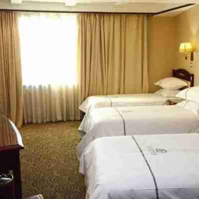 陸良鉑爾曼酒店 Rooms