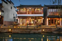 Qianshe Mengli Shuixiang Linhe Inn - Posadas