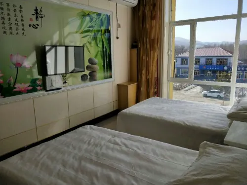 Keyou Qianqi Mountain City Xinjia Hotel