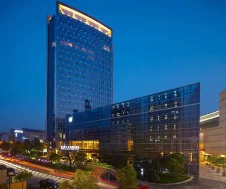 Grand New Century Hotel Fuyang Отели рядом с достопримечательностью «Hangzhou Polytechnic (Gaoke Road)»