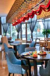 Grand Kingtown Hotel Wuxi - servizio colazione