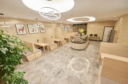 New Day Hotel (Wanda Branch, Siqian Street, Longwan Airport, Wenzhou) Отели рядом с достопримечательностью «Tianzhu Temple»