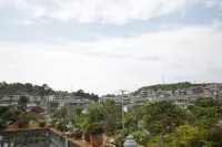Pu'er Shihoude Inn - Posadas