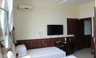 Ejina Xinfei Hotel