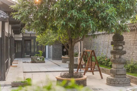 Blossom Hill Fairyland Отели рядом со станцией Langzhong Railway Station