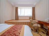维也纳国际酒店(宁波南部商务区罗蒙环球城店) - 影音浪漫大床房