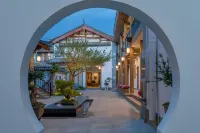 Floral Hotel · Qinyuan Hotel Hôtels à : Lijiang