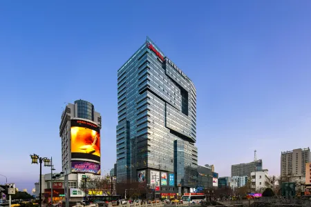 Hampton by Hilton Suning Plaza Suqian Отели рядом с достопримечательностью «Suqian University»