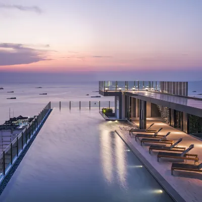 Many Holiday the Base Condo Отели рядом с достопримечательностью «Калссик Караоке»