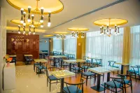 Elong Migao Fashion Hotel (Fei County New Bus Station)