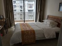 贵港联邦酒店公寓 - 阳台城景标准大床房