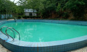 Dayang Ecological Village Holiday Hotel - Housity